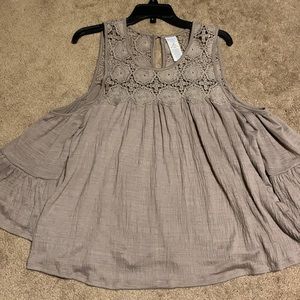 **SOLD**PracticallyNew/Beautiful Med khaki color babydoll or hippie type top
